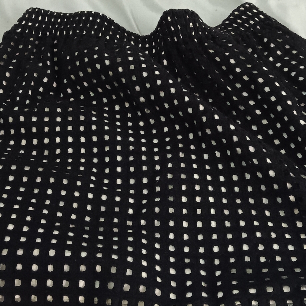 Small white skirt with fishnet like design